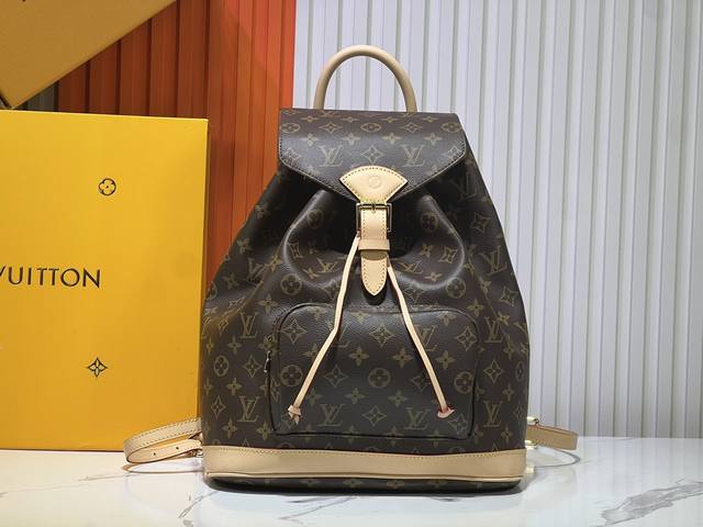 M11197 升级版变色皮 Nicolas GhesquièRe 回望 1994 年问世的 Montsouris 手袋，以 Monogram 涂层帆布和牛皮革饰