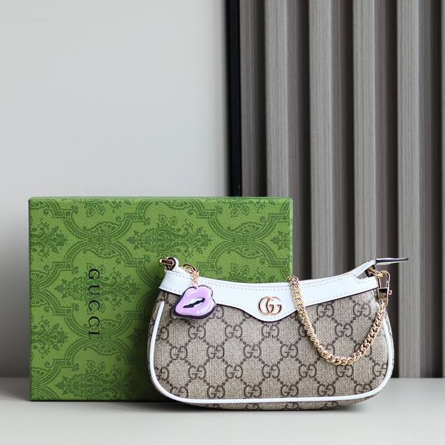 顶级原单 饰坠饰Gg超迷你肩背包784732 Fadc0 9744伦敦艺术家兼插画师Hattie Stewart的创意设计，为品牌早秋系列添注盎然活力和俏皮之感