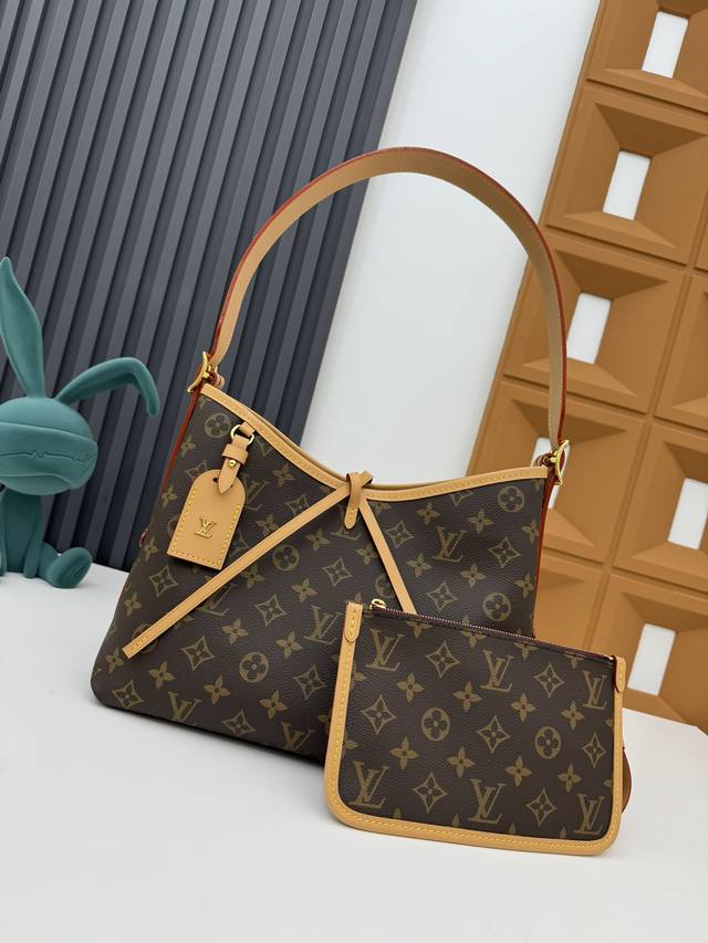 顶级原单 M46203 Carryall 小号手袋取材 Monogram 帆布和皮革饰边，成就都市生活的贴身伴侣。充裕构型设有齐整内层，大号内袋再添功能元素。M