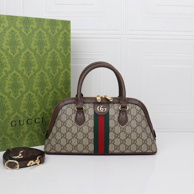 Ophidia系列以新意款式献礼早秋系列。这款手提包采用米色和乌木色Ggsupreme帆布制作，搭配可拆卸可调节肩带。品牌条纹织带元素和双G造型配件为这款单品添