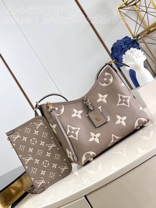 M46288灰丝印 M47180 本款 Carryall 小号手袋取材 Monogram Empreinte 压纹皮革，以柔软质地贴合身形。考究内层设有可拆卸拉 - 点击图像关闭