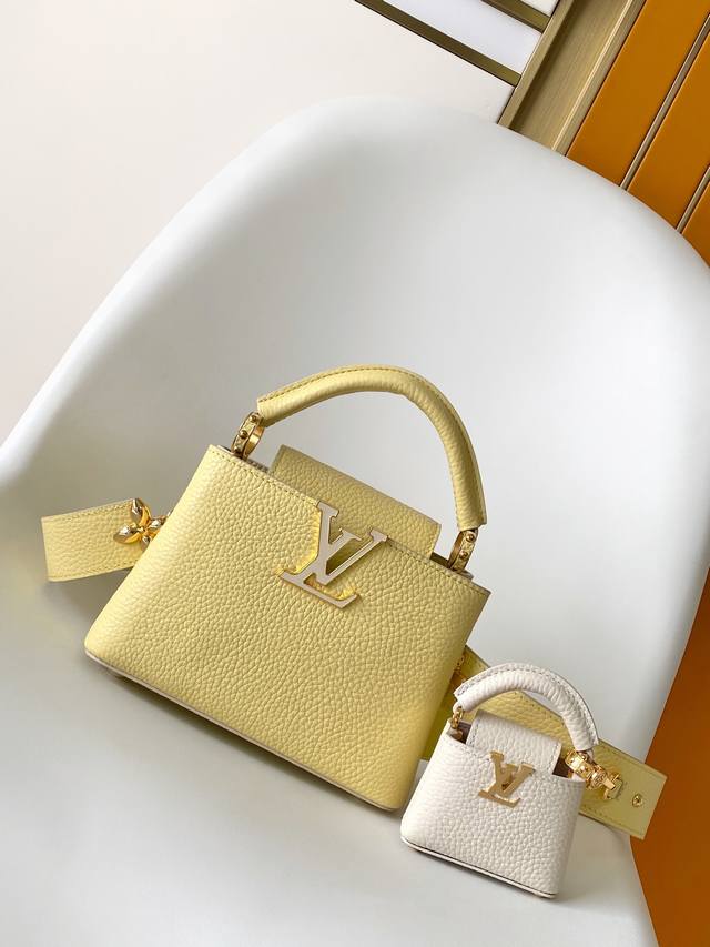 p1430M24575蓝 M24120粉 M24563黄 特级原厂皮 动态变码本款 Capucines 迷你手袋选用 Taurillon 皮革和宛若珠宝的釉面金