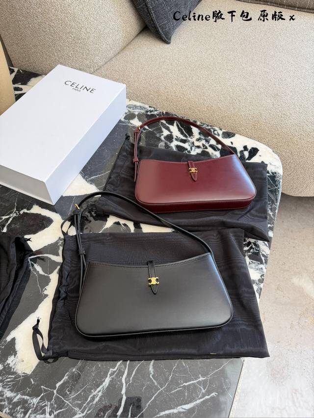 Celine Tina腋下法棍包 Celine Tina系列酒红，黑色 法棍包，选用优质牛皮，手感细腻耐用，金属磁扣设计，开合方便又安全。包型简约优雅，肩带长度