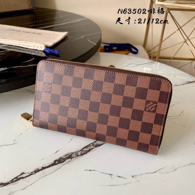 出厂价 芯片版 N63502 啡格 由时尚damier Graphite帆布裁制而成的zippy Organizer拉链钱夹,兼具时尚感与实用性,满足现代生活的 出厂价 芯片版 N63502 啡格 由时尚damier Graphite帆布裁制而成的zippy Organizer拉链钱夹,兼具时尚感与实用性,满足现代生活的